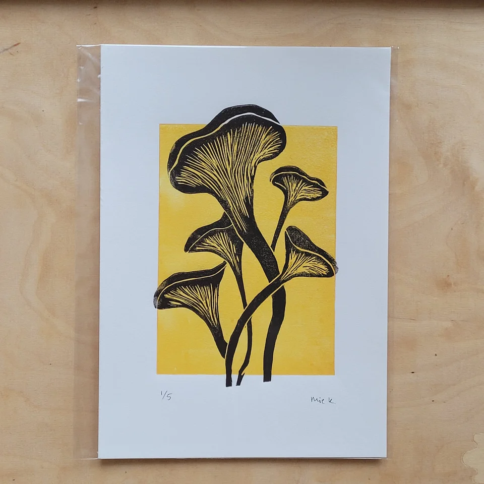 Linocut print of chanterelles